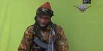<p>Foto tirada de um v&iacute;deo gravado pelo Boko Haram e&nbsp;que mostra o l&iacute;der do grupo insurgente,&nbsp;Abubakar Shekau</p>  Foto: Reuters