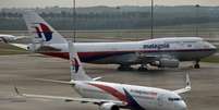 <p>Mesmo se a Malaysia Airlines garantir uma nova fonte de financiamento, permanecerão dúvidas sobre sua viabilidade no longo prazo</p>  Foto: Tomas Manan Vatsyayana / AFP