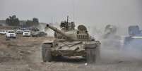 <p>Tanque de exército é visto durante os ataques no Iraque</p>  Foto: Stringer / Reuters