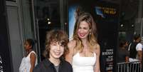 Luciana Gimenez e Lucas Jagger marcaram presença na première de Get On Up, em Nova York. Mick Jagger também esteve por lá  Foto: AFP