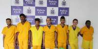 Integrantes de quadrilha comandada de dentro do presídio são apresentados após a prisão em Salvador  Foto: Denarc/BA / Divulgação