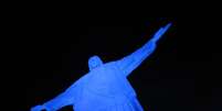 <p>O Cristo Redentor ganhou uma iluminação azul como forma de marcar a campanha Coração Azul</p><p> </p>  Foto: Vladimir Platonow / Agência Brasil
