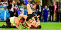 <p>Torcedor invade o gramado durante partida final da Copa, entre Alemanha e Argentina, no Est&aacute;dio do Maracan&atilde;. Rio de Janeiro</p>  Foto: Fernando Dantas / Gazeta Press