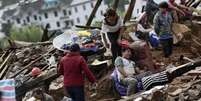 Milhares de pessoas foram prejudicadas pelo terremoto que atingiu a região sudoeste da China neste domingo  Foto: Wong Campion / Reuters