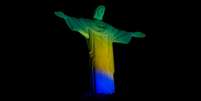 Cristo Redentor foi "pintado" em homenagem aos Jogos do Rio 2016  Foto: Daniel Ramalho / Terra