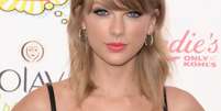 Neste domingo (10), muitos famosos marcaram presença no Teen Choice Awards, nos Estados Unidos. Na foto, Taylor Swift   Foto: Jason Merritt / Getty Images 