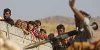 Refugiados saíram em massa do monte Sinjar, no Iraque, durante a última semana  Foto: Rodi Said / Reuters