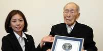 O japonês Sakari Momoi, aos 111 anos de idade, foi reconhecido nesta quarta-feira em Tóquio como o homem vivo mais velho do mundo  Foto: APAN POOL via JIJI PRESS / AFP