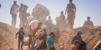 Refugiados sírios são vistos na Jordânia após fugirem de seu país por conflitos  Foto: Jared J. Kohler / AFP