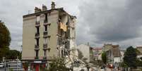 Bombeiros trabalham em escombros após explosão de prédio em Paris  Foto: BERTRAND GUAY / AFP