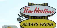 <p>Uma placa da rede&nbsp;Burger King e da Tim Hortons s&atilde;o exibidas em St. Laurent Boulevard, em Ottawa, no Canad&aacute;, em 25 de agosto</p>  Foto: he Canadian Press, Sean Kilpatrick / AP