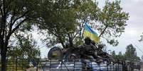 <p>Homens das forças de segurança ucraniana fazem ronda em Kramatorsk, Ucrânia, em 11 de setembro</p>  Foto: 