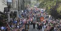 <p>Membros da Ordem protestante de Orange marcham durante uma manifestação contra a independência da Escócia, em Edimburgo, neste sábado, 13 de setembro</p>  Foto: Paul Hackett / Reuters