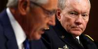 <p>O secretário da Defesa, Chuck Hagel, e o general Martin Dempsey participam de uma audiência no Senado, em Washington, em 16 de setembro</p>  Foto: Kevin Lamarque / Reuters