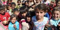 <p>Crianças sírias em um campo de refugiados próximo à cidade de Baalbek, no leste do Líbano</p><p> </p><p> </p>  Foto: Hussein Malla / AP