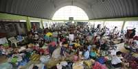 <p>Mais de 200 mil pessoas estão em centros de evacuação</p>  Foto: Bullit Marquez / AP