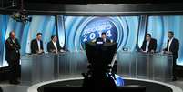 Candidatos ao governo do Rio de Janeiro, durante debate da TV Record  Foto: Fotos públicas/Tasso Marcelo / Divulgação