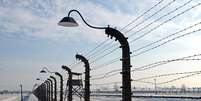 <p>Vista&nbsp;do antigo campo de concentra&ccedil;&atilde;o nazista de Auschwitz-Birkenau, em Oswiecim, Pol&ocirc;nia, em janeiro de 2014</p>  Foto: JANEK SKARZYNSKI / AFP