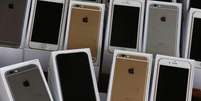 <p>E esperado que até o fim do ano, 115 nações consigam comercializar os celulares iPhone 6 e iPhone 6 Plus</p>  Foto: Bobby Yip / Reuters