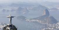 Estatua del Cristo redentor en Rio de Janeiro. Imagen de archivo, 27 junio, 2014. Las fusiones y adquisiciones corporativas en Brasil tomaron impulso en el tercer trimestre, pese a los mayores riesgos políticos y económicos, gracias a que empresas extranjeras by fondos de inversión privados buscaron objetivos de compra con la esperanza de explotar el potencial del país a largo plazo.  Foto: Ricardo Moraes / Reuters