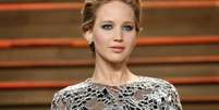 <p>A atriz Jennifer Lawrence foi uma das vítimas de hacker que roubou fotos íntimas de mais de 100 celebridades</p>  Foto: Danny Moloshok / Reuters