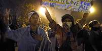 Pessoas manifestam no estado de Missouri contra racismo após a morte de mais um jovem negro pela polícia em 2014  Foto: Jim Young  / Reuters