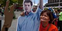 <p>Manifestante pede a liberta&ccedil;&atilde;o de Leopoldo L&oacute;pez</p>  Foto: Ansa Brasil / Reprodução