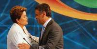 <p>Candidatos durante o debate realizado na TV Bandeirantes</p>  Foto: Paulo Whitaker / Reuters