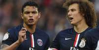 <p>Thiago Silva e David Luiz, dupla de zaga da Sele&ccedil;&atilde;o Brasileira, em a&ccedil;&atilde;o pelo PSG</p>  Foto: Frack Fife / AFP