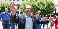 <p>José Ivo Sartori chega para votação no Colégio Carmo, em Caxias do Sul</p>  Foto: Luca Erbes / Futura Press