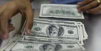 <p>Alta do d&oacute;lar seguiu tend&ecirc;ncia do exterior</p>  Foto: Romeo Ranoco / Reuters