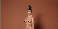 A revista Paper mostrou novas fotos do ensaio nu que Kim Kardashian fez para a edição de novembro da publicação   Foto: Divulgação