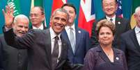 <p>Barack Obama acena ao lado de Dilma Rousseff durante encontro do G20 na Austrália</p>  Foto: Pablo Martinez Monsivais / Reuters