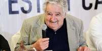 Presidente do Uruguai, José Mujica, sorri durante cerimônia de assinatura de acordos no México -5/12/2014.  Foto: Victor Ruiz Garcia / Reuters