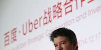 O CEO do Uber, Travis Kalanick, fala durante cerimônia sobre acordo com Baidu, em Pequim, em 17 de dezembro  Foto: Kim Kyung-Hoon / Reuters