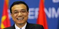 Premiê da China, Li Keqiang, sorri durante entrevista coletiva, em foto de arquivo. 17/12/2014  Foto: Djordje Kojadinovic / Reuters