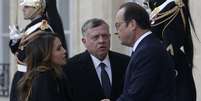 <p>O rei da Jordânia, Abdulla, e a esposa, a rainha Rania, também participaram do ato em Paris</p>  Foto: AP