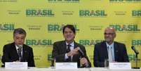 <p>Cid Gomes (ao centro) diz que tema da redação do Enem 2014 não foi tão debatido como o da lei seca, de 2013</p>  Foto: Wilson Dias / Agência Brasil