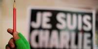 <p>A expressão "Je suis Charlie" foi criada por um cartunista francês imediatamente depois do atentado contra o jornal</p>  Foto: AFP