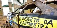 <p>Carro abandonado no Sistema Cantareira, na Grande São Paulo</p>  Foto: Nilton Cardin / Futura Press