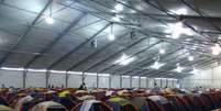 <p>Milhares de pessoas passam a semana inteira dormindo na área de camping do evento</p>  Foto: Jéssica Freitas / Terra