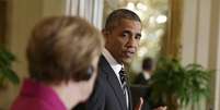 Obama cedeu uma coletiva de imprensa conjunta com a chanceler alemã, Angela Merkel, em Washington  Foto: Gary Cameron / Reuters