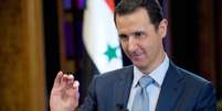 Foto divulgada pela agência de notícias estatal mostra o presidente sírio, Bashar al Assad, durante entrevista à BBC em Damasco  Foto: AP