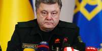 <p>Presidente ucraniano, Petro Poroshenko, pediu envio de oficiais ao leste do país</p>  Foto: Valentyn Ogirenko / Reuters