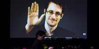 Snowden aparece em vídeo durante conferência em colégio do Canadá, em fevereiro de 2015  Foto: Mark Blinch / Reuters