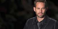 <p>Paul Walker durante desfile em São Paulo, em foto de arquivo</p>  Foto: Filipe Carvalho / Reuters