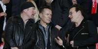 Membros da banda irlandesa U2 lamentaram morte do colega  Foto: Eric Gaillard / Reuters