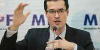 Deltan Dallagnol na apresentação de medidas anticorrupção propostas pelo MPF (Ag Brasil)  Foto: BBC Mundo / Copyright