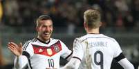 Podolski fez o gol de empate da Alemanha  Foto: Daniel Roland / Getty Images 
