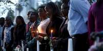 <p>Quenianos fazem homenagem a mortos em ataque &agrave;&nbsp;universidade</p>  Foto: Goran Tomasevic / Reuters